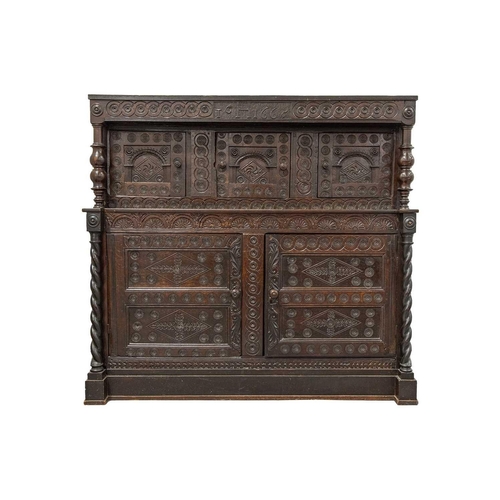 120 - A Large 17th century and later oak Court Cupboard, dated 1665, with guilloche and lozenge carving, t... 