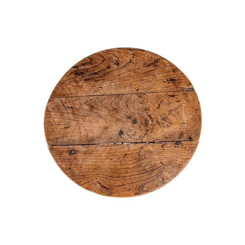 133 - An early 19th-century rustic elm cricket table with a planked top of good mellow colour, the base wi... 