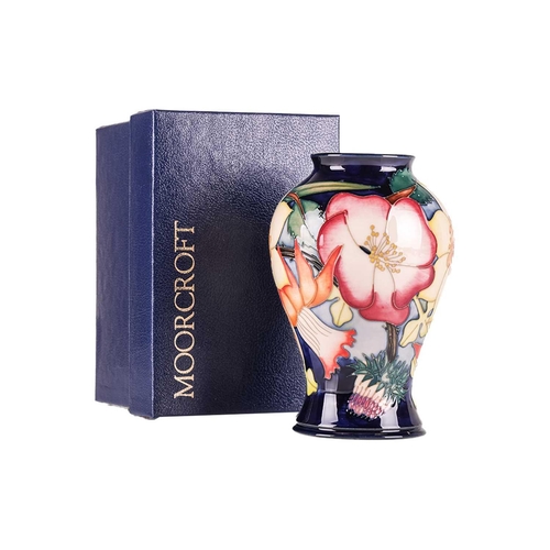 174 - Four boxed contemporary Moorcroft vases, comprising a large 'African Bride' pattern vase, limited ed... 