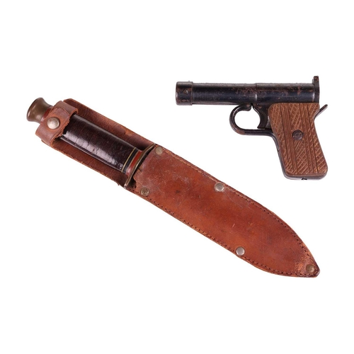 226 - A WW2 Taylor's 'Eye Witness' double-edged fighting knife with original leather scabbard, fitted a br... 