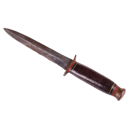 226 - A WW2 Taylor's 'Eye Witness' double-edged fighting knife with original leather scabbard, fitted a br... 