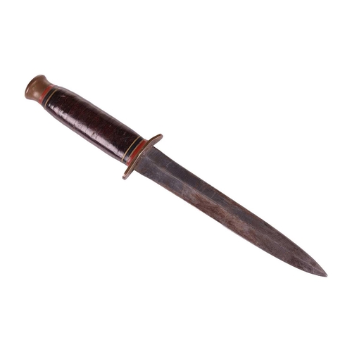 226 - A WW2 Taylor's 'Eye Witness' double-edged fighting knife with original leather scabbard, fitted a br... 