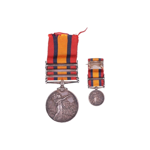 229 - A Victoria South Africa war medal with ribbon and 3 bars, together with conforming miniature, named ... 