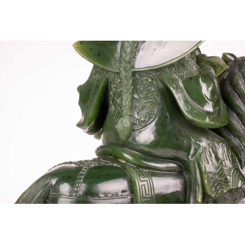 58 - A pair of large and impressive Chinese spinach green jade equestrian carvings, 20th century, one mou... 