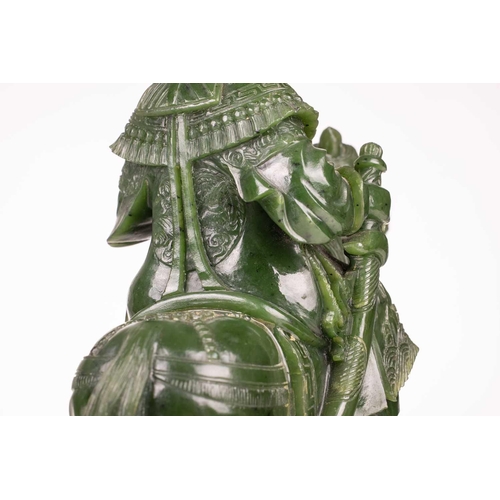 58 - A pair of large and impressive Chinese spinach green jade equestrian carvings, 20th century, one mou... 