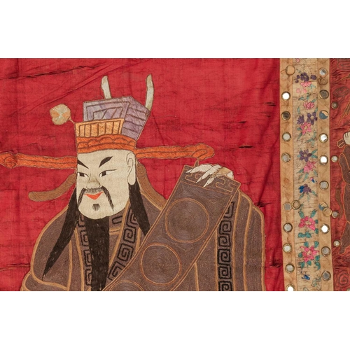 61 - A large Chinese 19th/20th-century red silk embroidered imperial portrait of the Emporer bordered wit... 