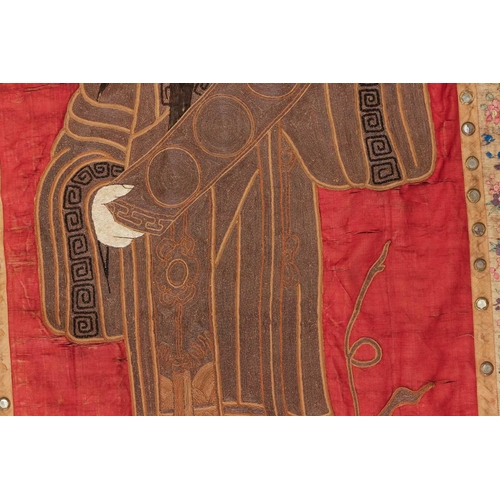 61 - A large Chinese 19th/20th-century red silk embroidered imperial portrait of the Emporer bordered wit... 