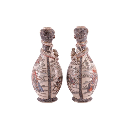 62 - A large pair of Japanese Satsuma pottery double gourd vases, Meiji period, late 19th century, modell... 