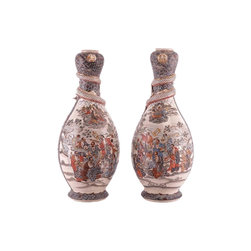 62 - A large pair of Japanese Satsuma pottery double gourd vases, Meiji period, late 19th century, modell... 