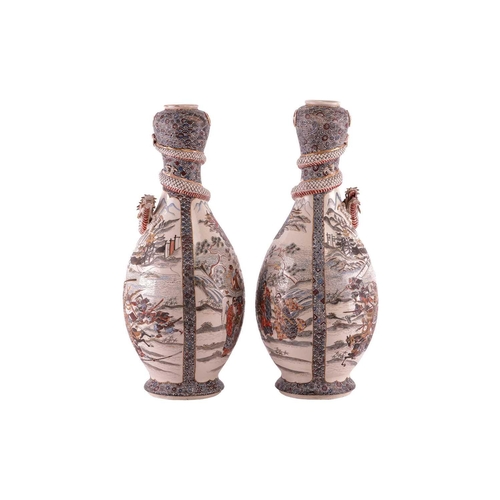 62 - A large pair of Japanese Satsuma pottery double gourd vases, Meiji period, late 19th century, modell... 