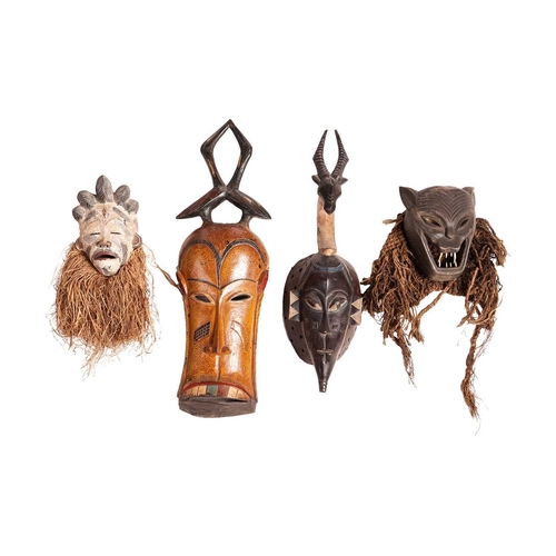 66 - Six various African Tribal carvings including a Luba Witch Doctor figure, 47 cm high, and two Ivory ... 