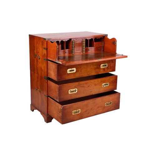 70 - A good quality reproduction yew wood two-section campaign secretaire with folding bale handles and c... 