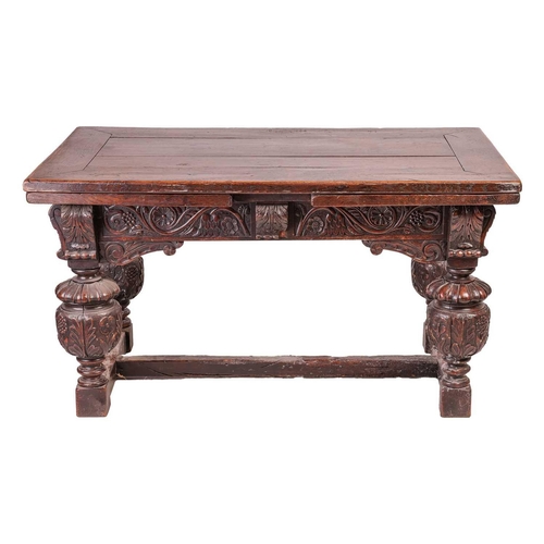 77 - A part Elizabeth I oak rectangular draw leaf table, with adzed and clamped plank top and leaves abov... 