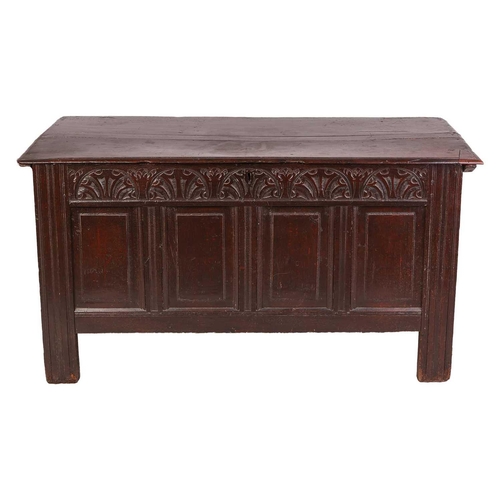 81 - Late 17th-century oak coffer, carved with an arcaded frieze above a four-panel front, on stile suppo... 