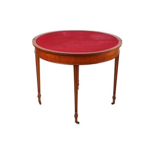 84 - A George III-style demilune satinwood foldover card table, the top opening to reveal inset crimson W... 