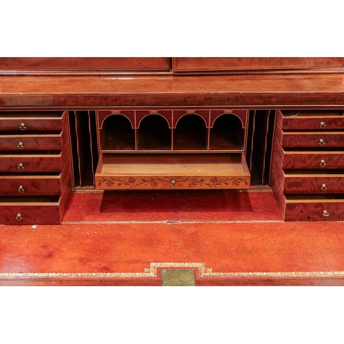 99 - A late George III mahogany secretaire bookcase, the pediment inlaid with a fouled anchor (1805?), ab... 