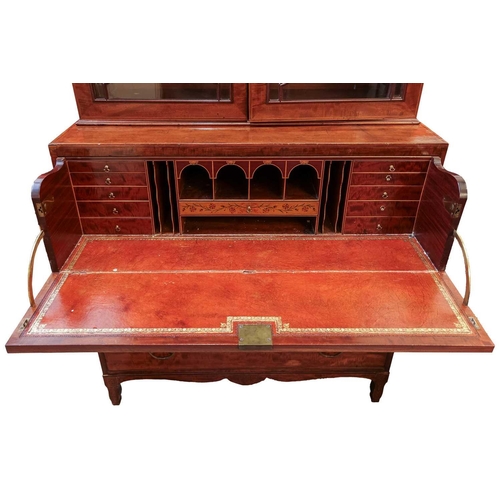 99 - A late George III mahogany secretaire bookcase, the pediment inlaid with a fouled anchor (1805?), ab... 