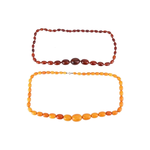 10 - Two beaded necklaces; to include a single-strand amber bead necklace with graduated butterscotch amb... 