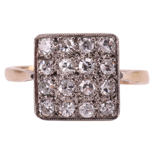 12 - A diamond-set plaque ring, sixteen transitional cut stones pave set in a grid, bordered with milgrai... 