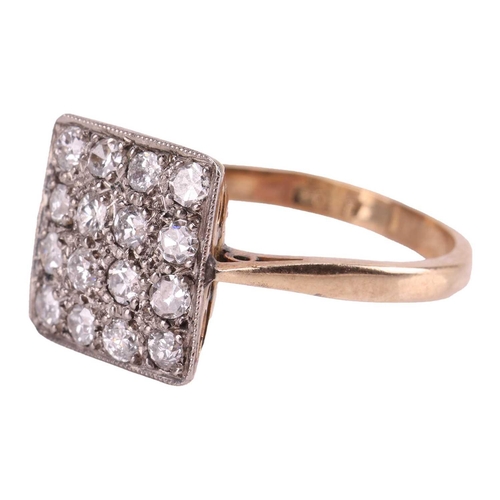 12 - A diamond-set plaque ring, sixteen transitional cut stones pave set in a grid, bordered with milgrai... 