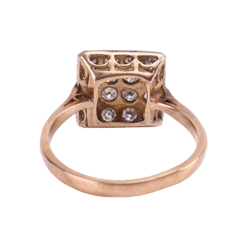 12 - A diamond-set plaque ring, sixteen transitional cut stones pave set in a grid, bordered with milgrai... 