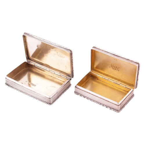 323 - Two silver snuff boxes; comprising a Victorian silver snuff box, rectangular with cast foliate borde... 