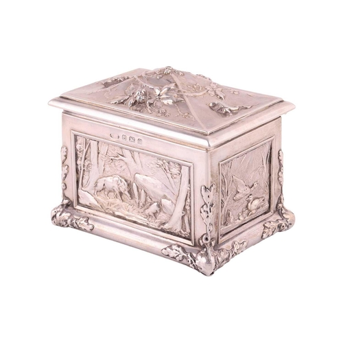 324 - An Arts and Crafts silver casket, by Albert Edward Jones, Birmingham 1906, the rectangular form body... 