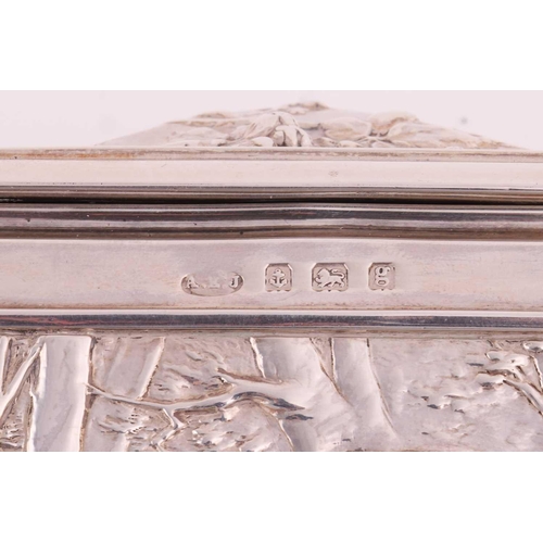 324 - An Arts and Crafts silver casket, by Albert Edward Jones, Birmingham 1906, the rectangular form body... 