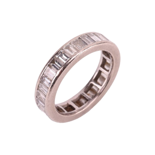 40 - A diamond-set eternity ring, with an estimated total carat weight of 2.03ct, featuring a single row ... 