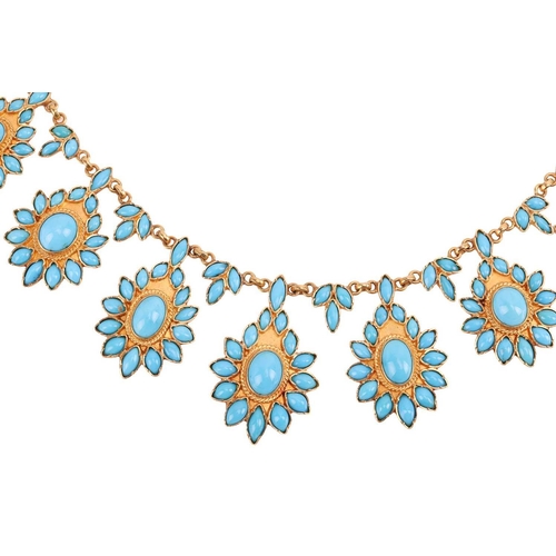 53 - A turquoise cluster fringe necklace, comprising nine graduating floral clusters composed of oval and... 