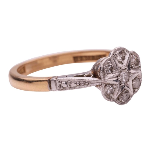 54 - A diamond ring of floral design, estimated total diamond carat weight 0.07ct, set in yellow and whit... 