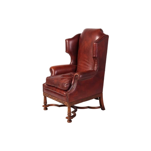 108 - A craftsman-made William III-style hide-covered wingback armchair, possibly Brights of Nettlebed (Ox... 