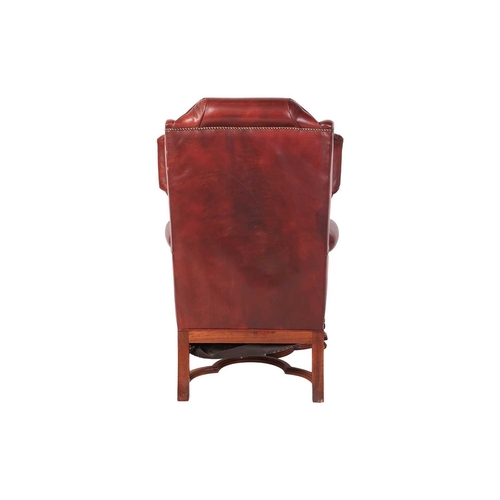 108 - A craftsman-made William III-style hide-covered wingback armchair, possibly Brights of Nettlebed (Ox... 