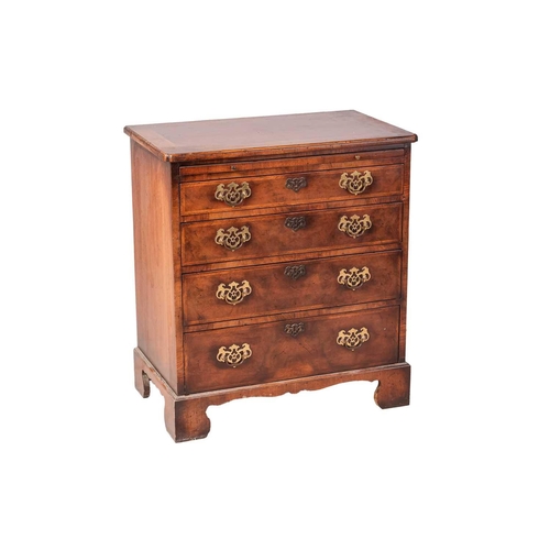 111 - A George I style walnut Batchelor's chest of four long graduated drawers, with a brushing slide supp... 