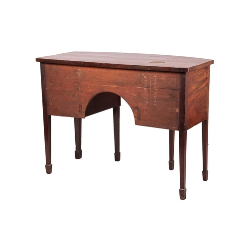 114 - A George III mahogany small bowfront kneehole sideboard, with a central frieze drawer and two deep s... 