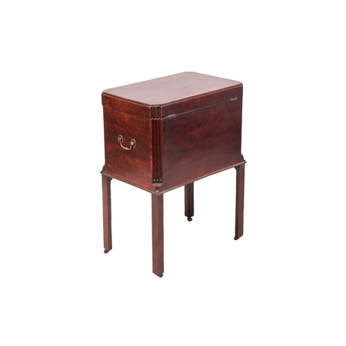 115 - A George III saddleback mahogany cellarette box circa 1760, with fluted canted corners, a vacant int... 