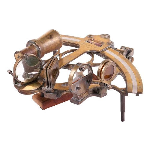 120 - An early 20th-century brass four-glass sextant, by Troughton & Simms, London, 25.5 cm wide, together... 