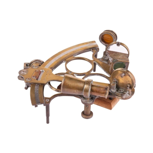 120 - An early 20th-century brass four-glass sextant, by Troughton & Simms, London, 25.5 cm wide, together... 