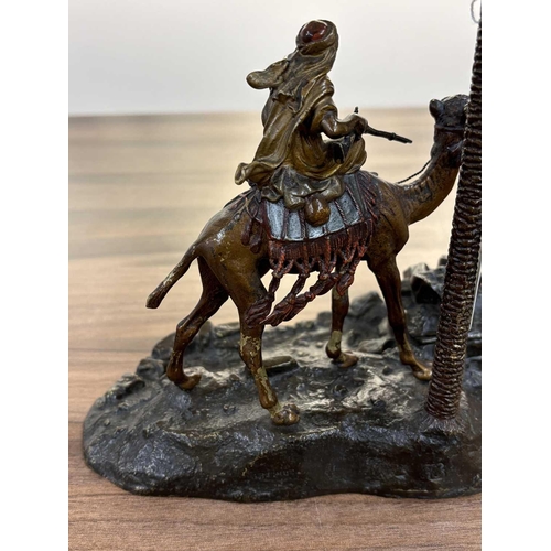 123 - Franz Bergman: an Austrian cold-painted ink stand in the bronze figural inkstand, modelled as a bedo... 