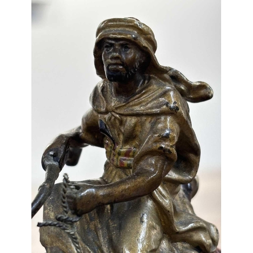 123 - Franz Bergman: an Austrian cold-painted ink stand in the bronze figural inkstand, modelled as a bedo... 