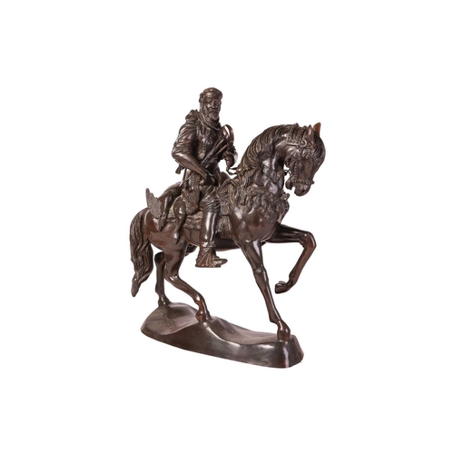 126 - A very large patinated bronze figure of an Arab figure on a horse, 20th century, after Antoine-Louis... 