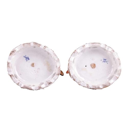 136 - A pair of Meissen porcelain lace-edged figures of a lady and gallant, the second half of the 19th ce... 