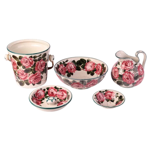 137 - A Wemyss pottery Cabbage Rose wash set, comprising a wash basin, water jug, large pail and a drainin... 