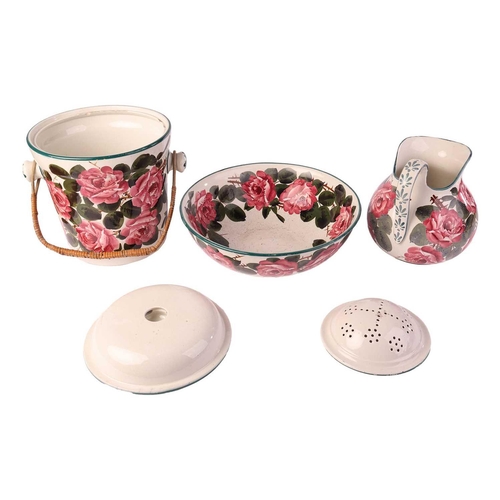 137 - A Wemyss pottery Cabbage Rose wash set, comprising a wash basin, water jug, large pail and a drainin... 