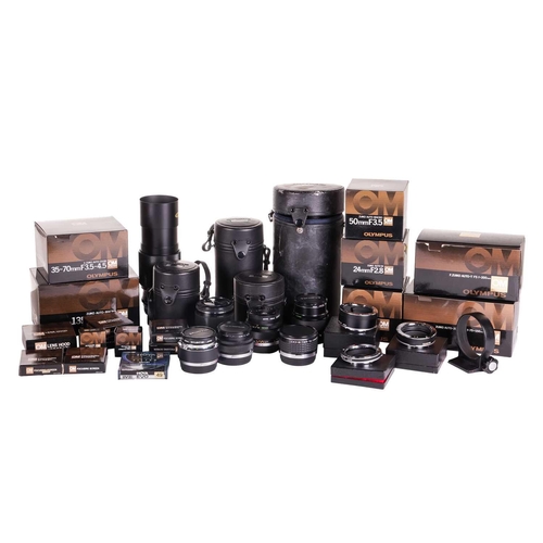 147 - A large collection of Olympus OM System camera lenses, comprising: Zuiko Auto-Macro 135mm F4.5, Zuik... 