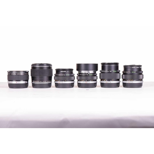 147 - A large collection of Olympus OM System camera lenses, comprising: Zuiko Auto-Macro 135mm F4.5, Zuik... 