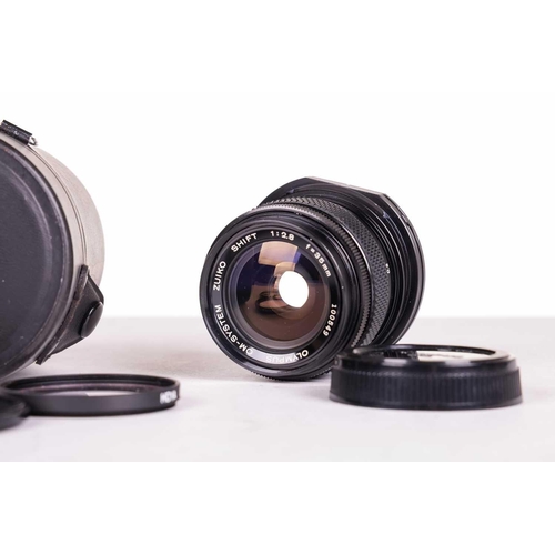 147 - A large collection of Olympus OM System camera lenses, comprising: Zuiko Auto-Macro 135mm F4.5, Zuik... 