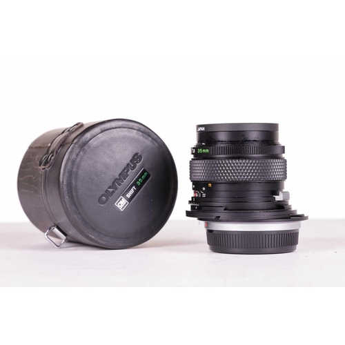 147 - A large collection of Olympus OM System camera lenses, comprising: Zuiko Auto-Macro 135mm F4.5, Zuik... 