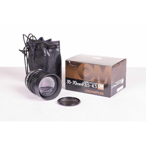 147 - A large collection of Olympus OM System camera lenses, comprising: Zuiko Auto-Macro 135mm F4.5, Zuik... 