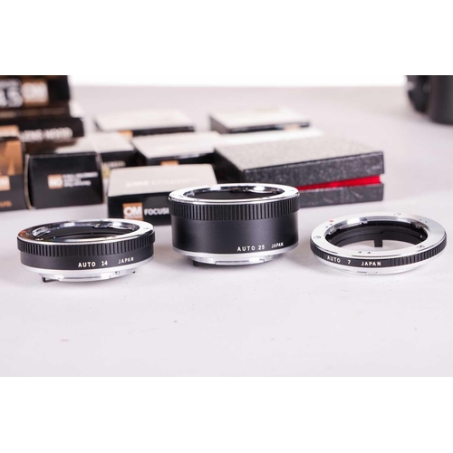 147 - A large collection of Olympus OM System camera lenses, comprising: Zuiko Auto-Macro 135mm F4.5, Zuik... 